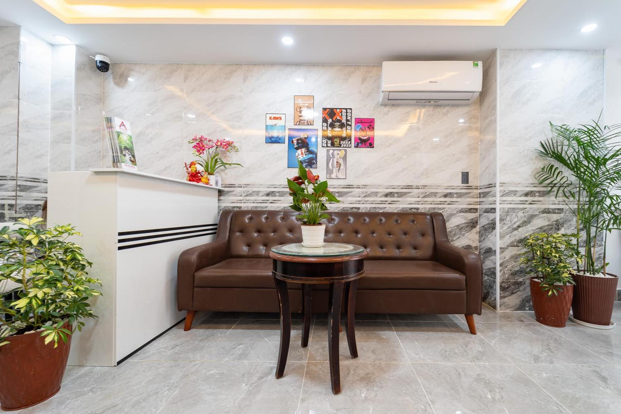 Khách sạn Collection O Madam Cuc Bui Vien Hotel.